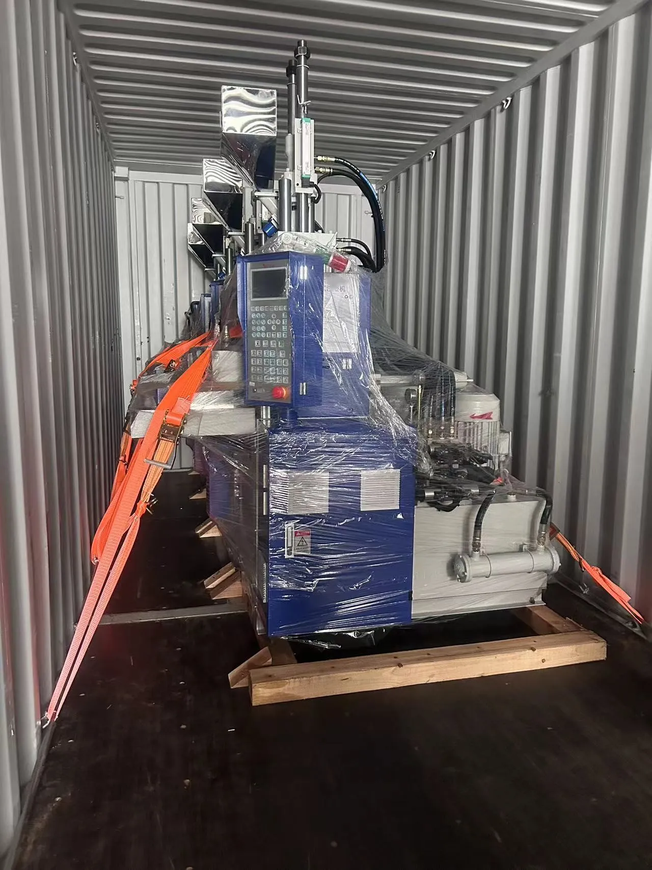 Deboge machines being loaded into shipping containers at Ningbo port for global delivery