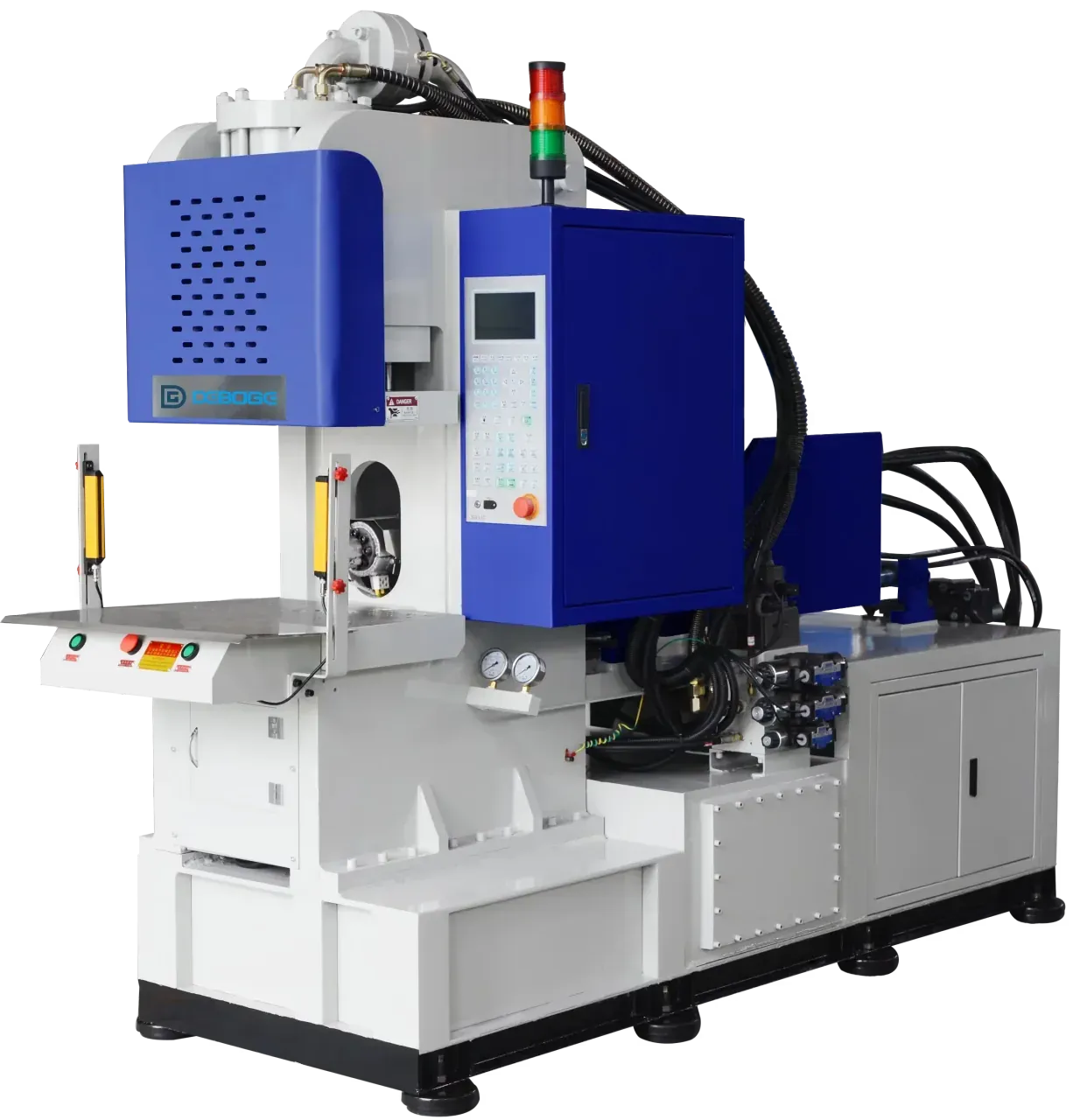 DC-450 fixed-platen machine with an open working area and a horizontal injection unit.