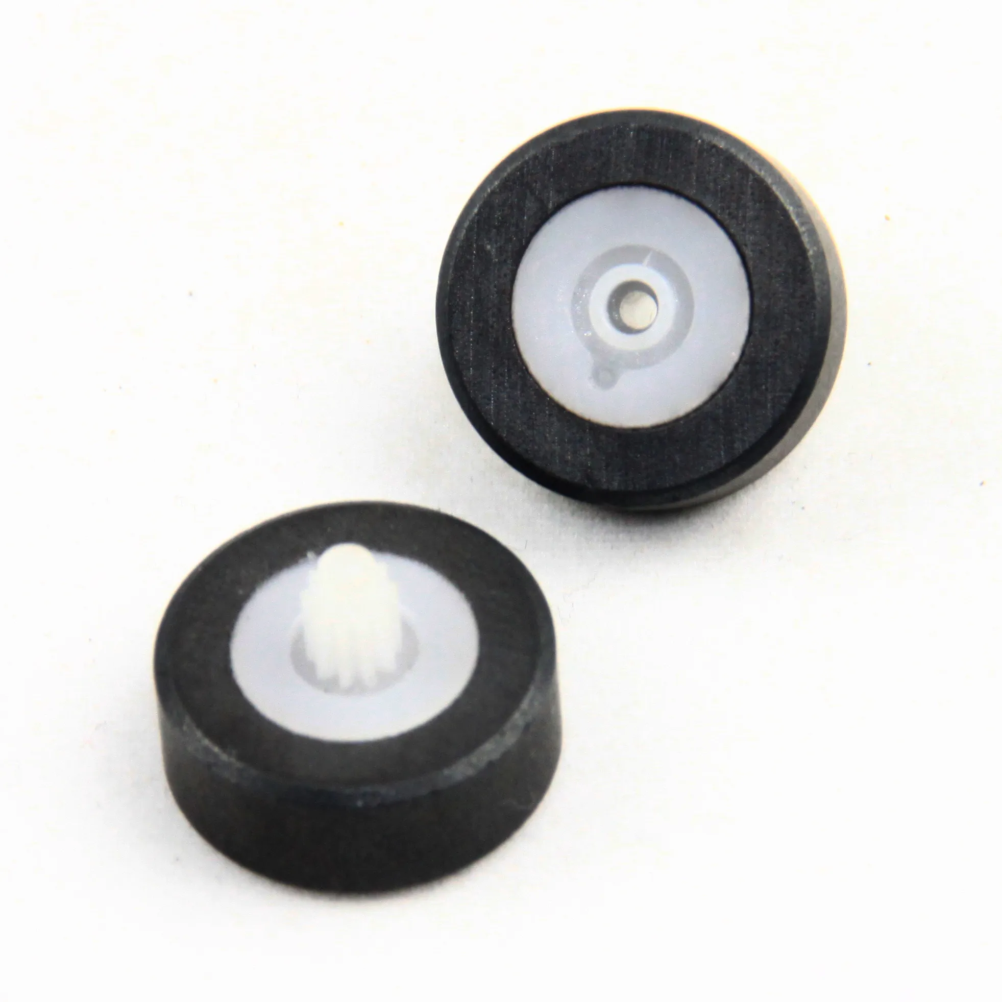 Overmolded product with two materials bonded